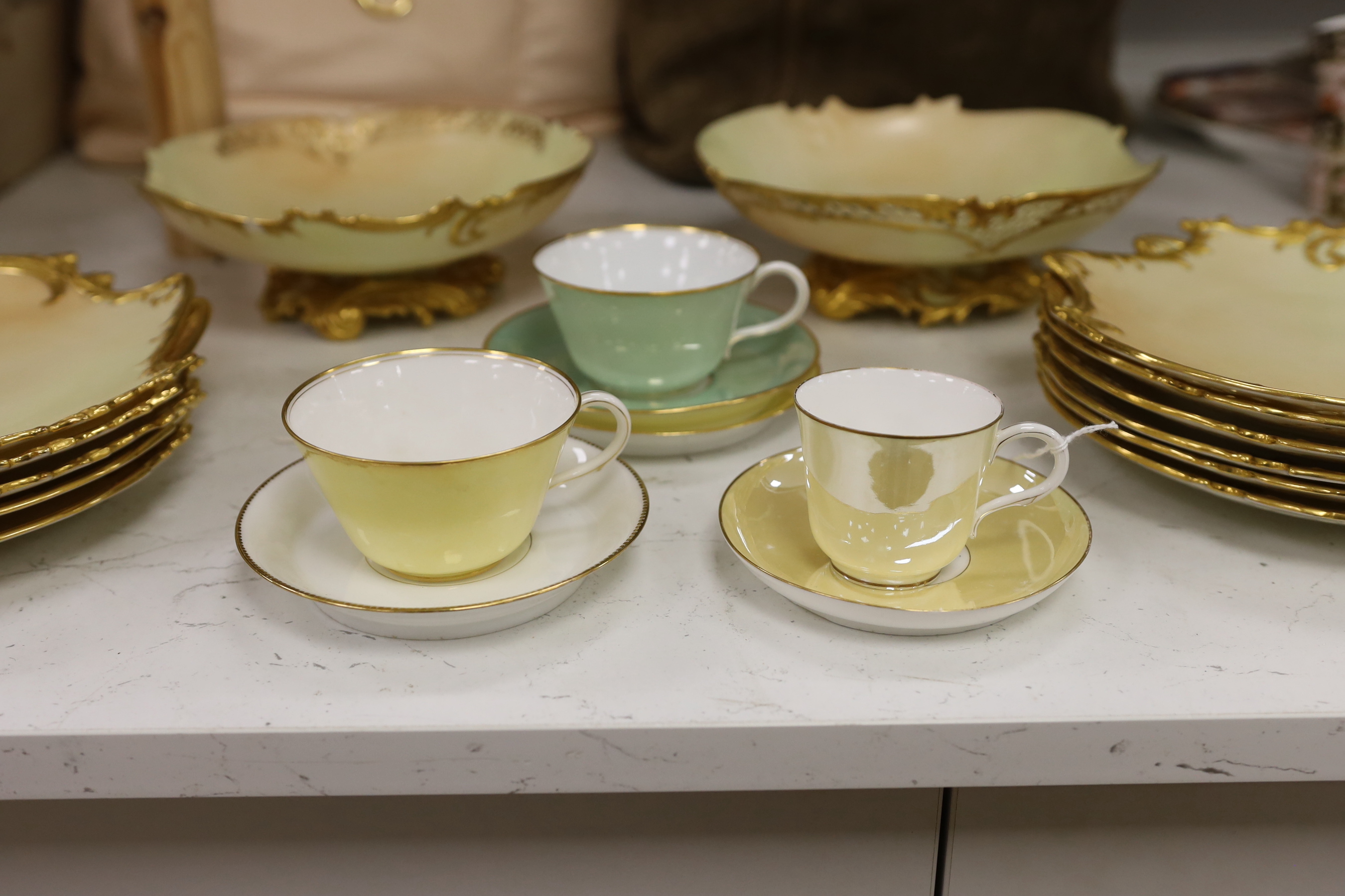 A Royal Worcester blush ivory part dessert set and a harlequin set of lustre tea wares